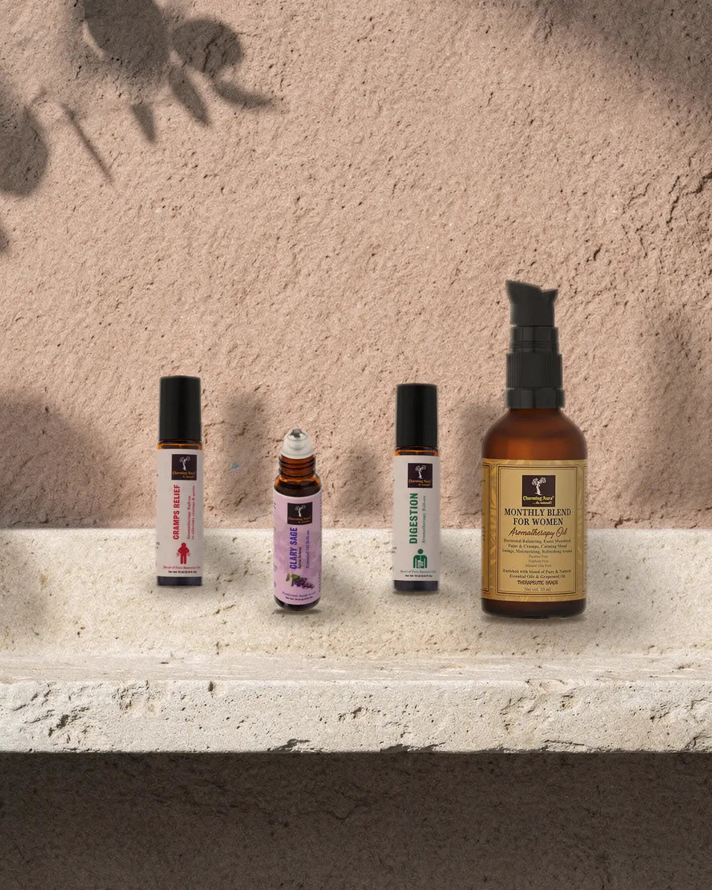 Ushma, Muskatellersalbei und Agni Roll-on mit Ushma Massageöl auf einer Putzkante